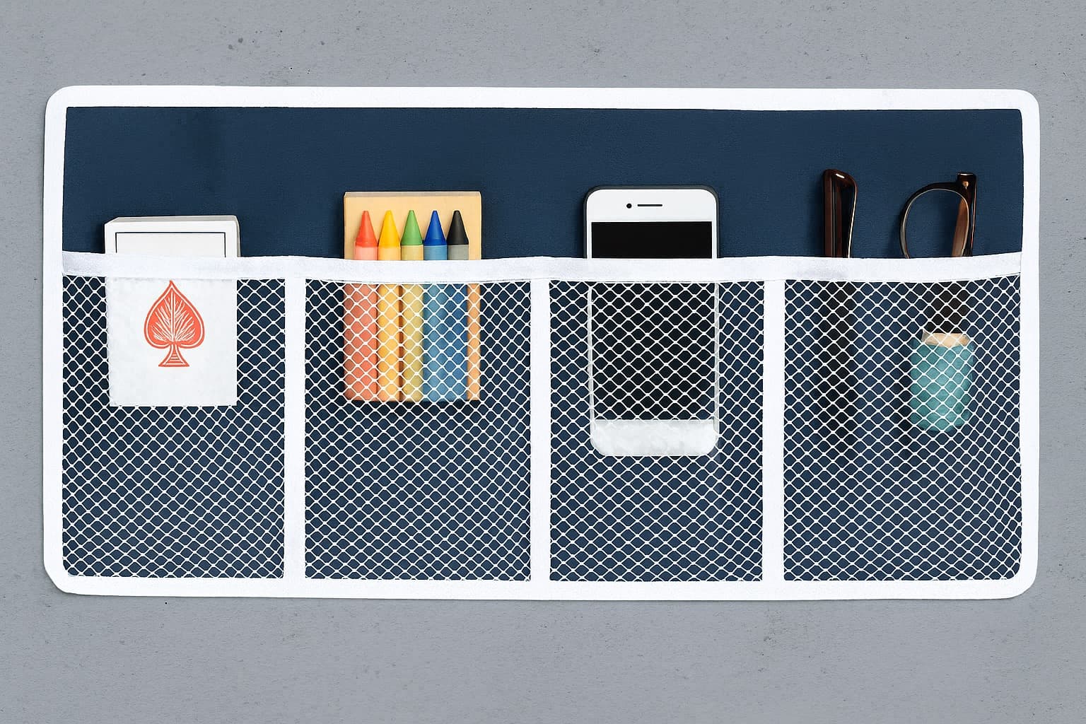 Walnut desk organizer set with white modular trays, next to porcelain mug on wooden desk.