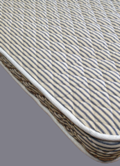 top of coil mattress showing ticking - NAVSEA approved, fire-resistant mattress, shipboard mattress