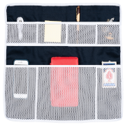 stored items in ultimate wall caddy - rack wall caddys, navy rack accessories, rack wall storage